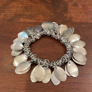 Stretchy Silvertone jingle bracelet